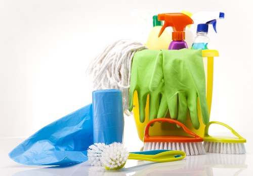 Worker checking PPE before starting task