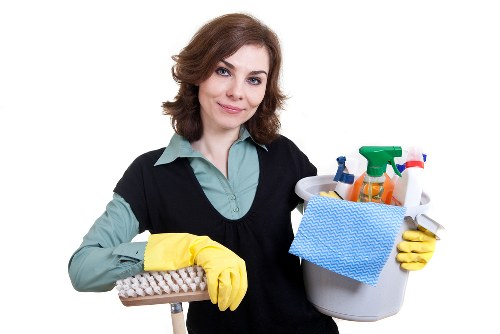 Kitchen surfaces being cleaned during house cleaning