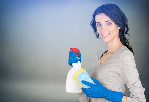 Cleaner disinfecting high-touch surfaces in a shared building